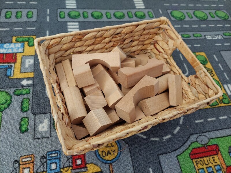 an image of children's wooden building blocks